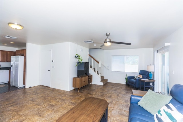 87-2113 Pakeke St, Waianae, HI 96792 - living area with stone finish flooring, stairway, and ceiling fan