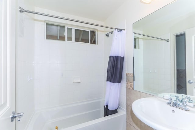 87-2113 Pakeke St, Waianae, HI 96792 - bathroom featuring shower / tub combo and tile walls