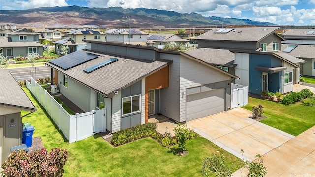 91-1804 Kohanahana Loop, Ewa Beach, HI 96706 - view of front of property featuring a residential view, a mountain view, solar panels, a gate, and a shingled roof