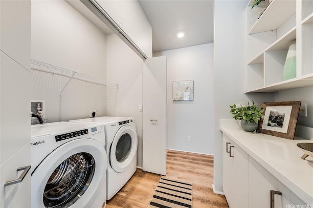 91-1804 Kohanahana Loop, Ewa Beach, HI 96706 - laundry area featuring washer and clothes dryer and light wood-style flooring
