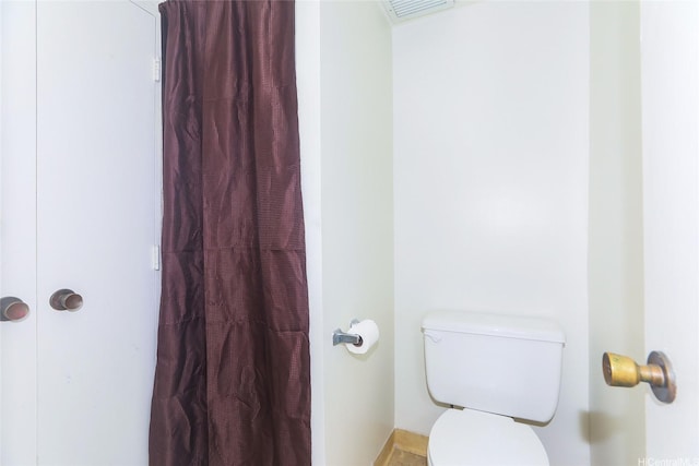 2333 Kapiolani Blvd Unit 608, Honolulu, HI 96826 - bathroom with toilet and a shower with curtain
