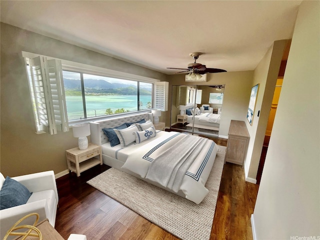 46-035 Konohiki St Unit 3832, Kaneohe, HI 96744 - bedroom with wood finished floors and ceiling fan