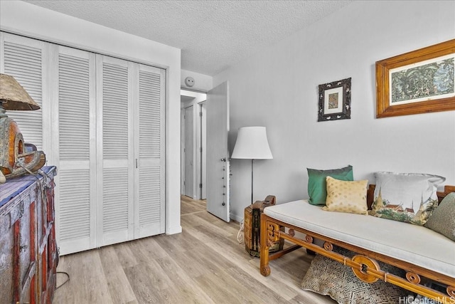 1350 Ala Moana Blvd Unit 3004, Honolulu, HI 96814 - living area with light wood-type flooring and a textured ceiling