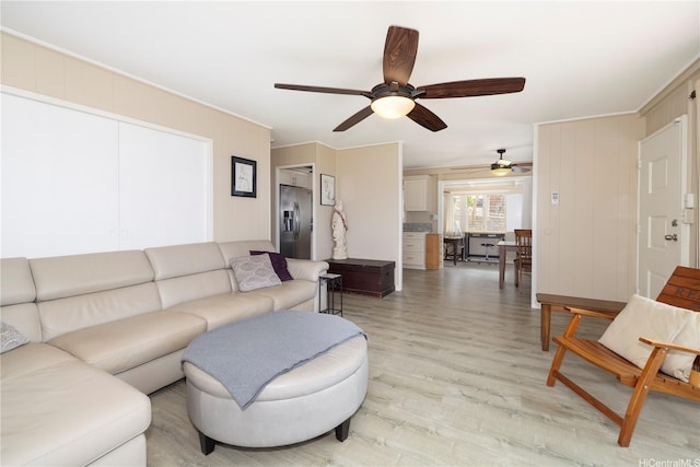 92-1020 Palailai Pl, Kapolei, HI 96707 - living room with ceiling fan, light wood finished floors, and ornamental molding