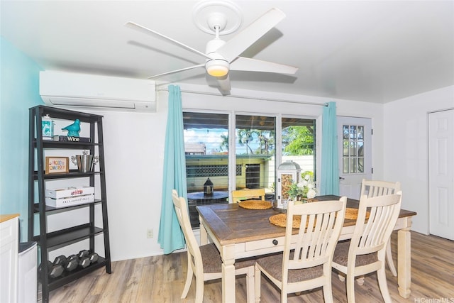 94-271 Kupulau Pl, Mililani, HI 96789 - dining area with an AC wall unit, ceiling fan, and light wood finished floors