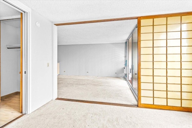 1676 Ala Moana Blvd Unit 1303, Honolulu, HI 96815 - hallway featuring carpet and a textured ceiling