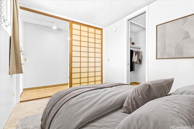 1676 Ala Moana Blvd Unit 1303, Honolulu, HI 96815 - bedroom featuring a closet and a textured ceiling