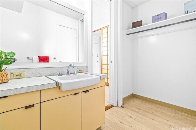1676 Ala Moana Blvd Unit 1303, Honolulu, HI 96815 - bathroom with wood finished floors and vanity