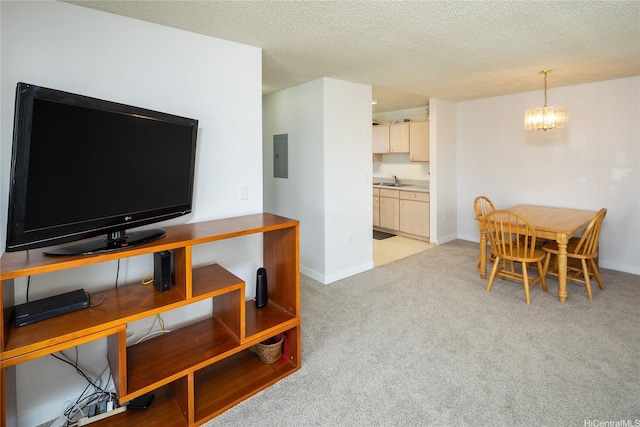 94-534 Kupuohi St Unit 21202, Waipahu, HI 96797 - dining space featuring light colored carpet, a textured ceiling, electric panel, and a chandelier