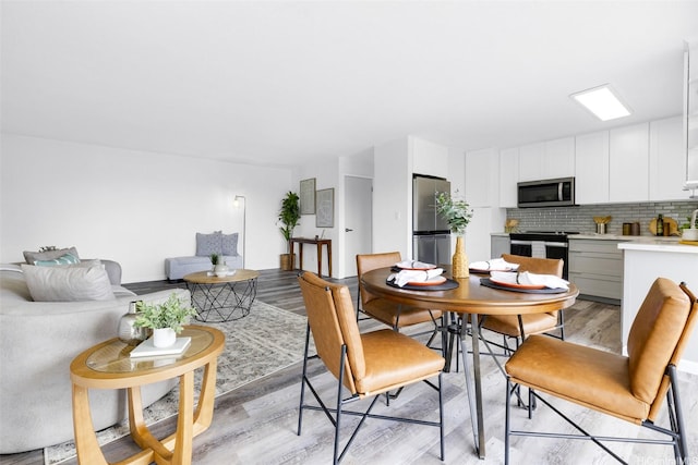 625 Iolani Ave Unit A304, Honolulu, HI 96813 - dining area featuring light wood-type flooring
