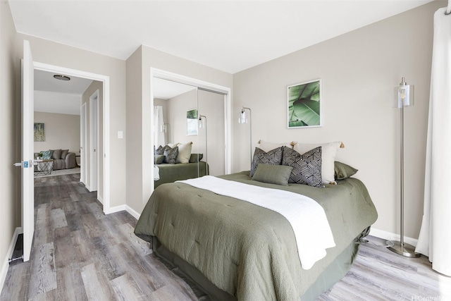 625 Iolani Ave Unit A304, Honolulu, HI 96813 - bedroom featuring wood finished floors and a closet