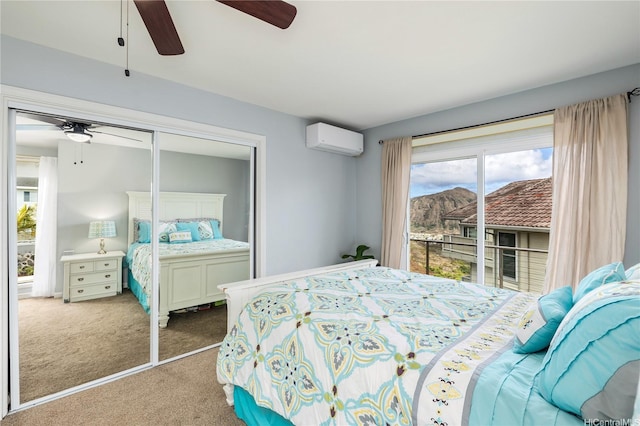 1048 Kaupaku Pl, Honolulu, HI 96825 - bedroom featuring an AC wall unit, carpet flooring, a closet, and a ceiling fan