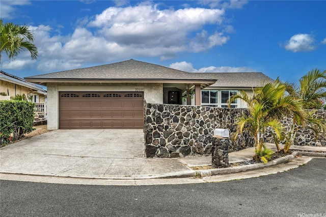 1048 Kaupaku Pl, Honolulu, HI 96825 - ranch-style house featuring an attached garage, driveway, stucco siding, and a shingled roof