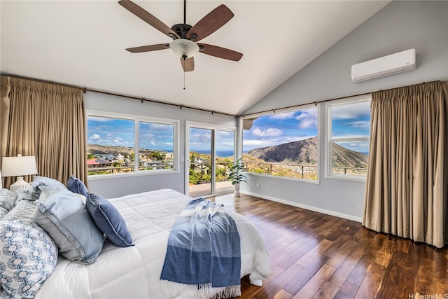 1048 Kaupaku Pl, Honolulu, HI 96825 - bedroom with an AC wall unit, access to exterior, vaulted ceiling, wood finished floors, and multiple windows