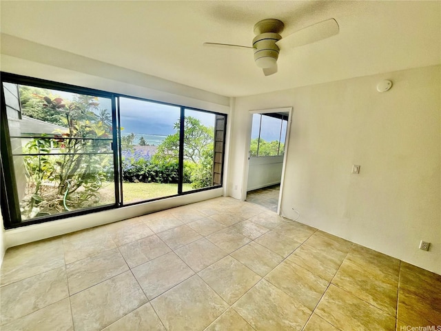 51-636 Kamehameha Hwy Unit 4412, Kaaawa, HI 96730 - empty room featuring a ceiling fan, a smoke detector, and light tile patterned flooring