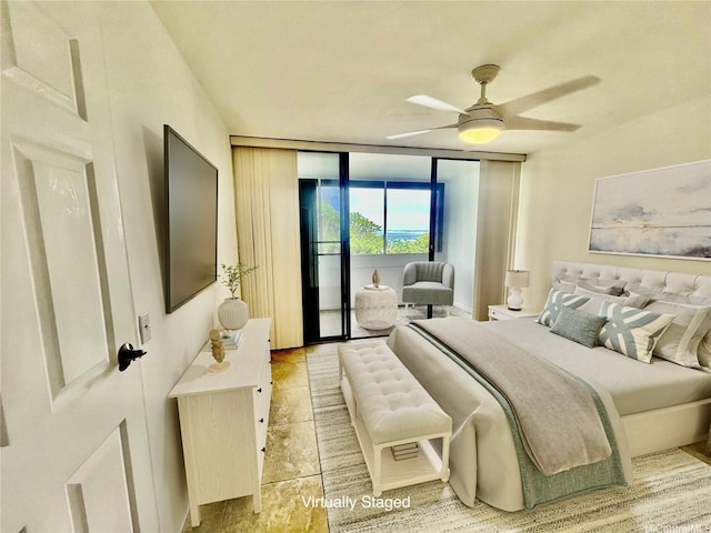 51-636 Kamehameha Hwy Unit 4412, Kaaawa, HI 96730 - bedroom with access to exterior, a ceiling fan, and a wall of windows