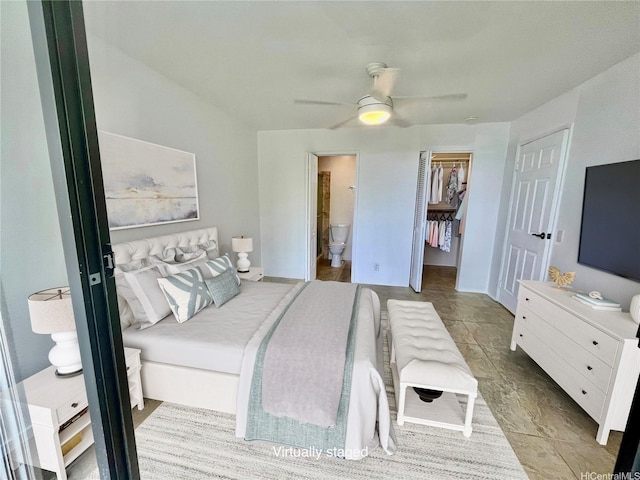 51-636 Kamehameha Hwy Unit 4412, Kaaawa, HI 96730 - bedroom featuring connected bathroom, a walk in closet, ceiling fan, and a closet