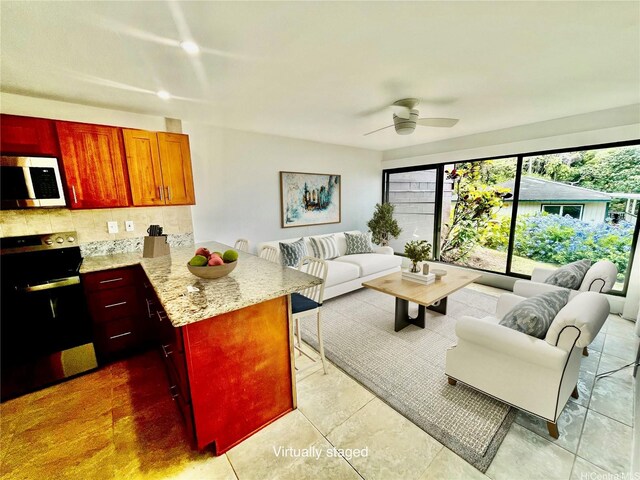 51-636 Kamehameha Hwy Unit 4412, Kaaawa, HI 96730 - living room featuring ceiling fan