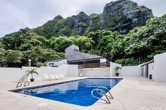 51-636 Kamehameha Hwy Unit 4412, Kaaawa, HI 96730 - community pool with a patio area and a mountain view