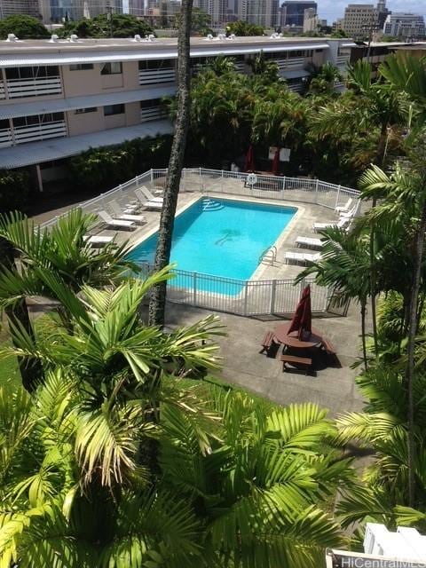 1330 Wilder Ave Unit 219, Honolulu, HI 96822 - community pool featuring a city view and a patio