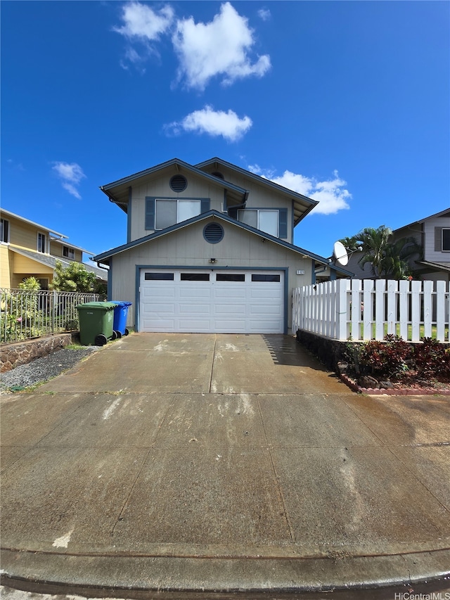 91-1028 Waihuna Pl, Ewa Beach, HI 96706 - traditional home featuring driveway and a garage