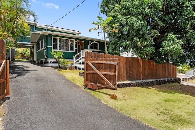 1371 Hele St, Kailua, HI 96734 - view of front facade with asphalt driveway