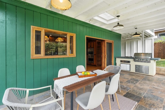 1371 Hele St, Kailua, HI 96734 - view of patio featuring an outdoor kitchen, ceiling fan, and outdoor dining area