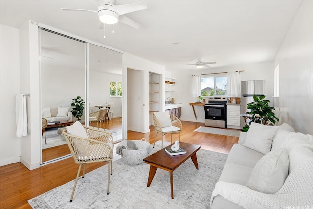 54-18 Haukoi Pl, Hauula, HI 96717 - living area with a ceiling fan and light wood finished floors