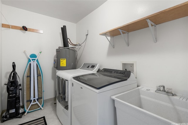 54-18 Haukoi Pl, Hauula, HI 96717 - laundry room with washer and clothes dryer and light tile patterned floors