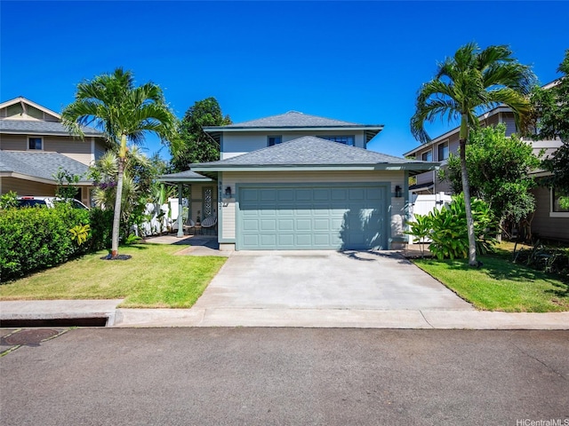 94-1157 Kaloli Loop, Waipahu, HI 96797 - view of front facade with an attached garage, a front lawn, driveway, and roof with shingles
