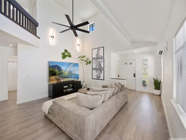 94-1157 Kaloli Loop, Waipahu, HI 96797 - living area with wood finished floors, a wall mounted AC, a ceiling fan, high vaulted ceiling, and recessed lighting