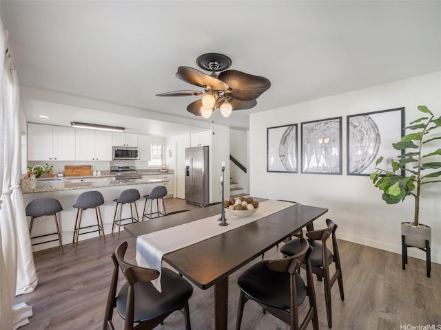 94-1157 Kaloli Loop, Waipahu, HI 96797 - dining space with stairway, wood finished floors, and ceiling fan