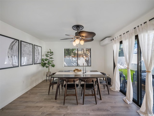 94-1157 Kaloli Loop, Waipahu, HI 96797 - dining room with a wall mounted AC, wood finished floors, and ceiling fan