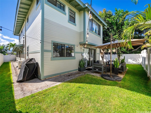 94-1157 Kaloli Loop, Waipahu, HI 96797 - back of property featuring outdoor lounge area, a fenced backyard, and a patio area