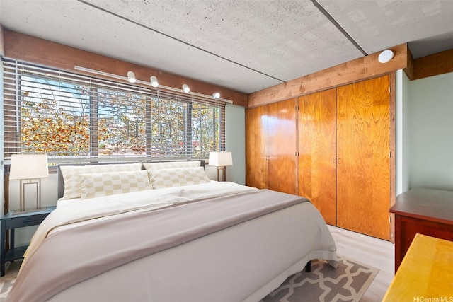 98-310 Kamehameha Hwy Unit 224, Aiea, HI 96701 - bedroom with light wood-style floors and a closet