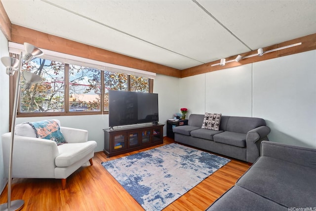 98-310 Kamehameha Hwy Unit 224, Aiea, HI 96701 - living area with plenty of natural light and wood finished floors