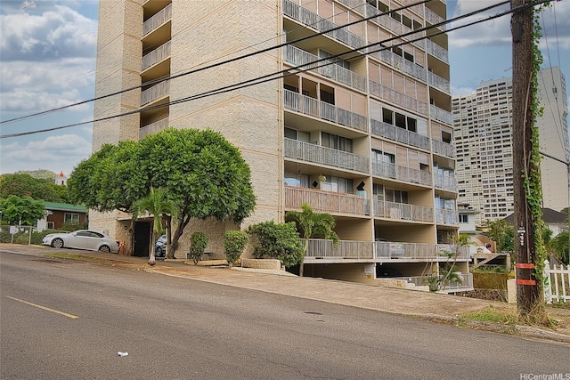 1687 Pensacola St Unit 1004, Honolulu, HI 96822 - view of apartment building / complex