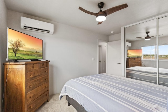 91-1640 Honouliuli St Unit 82, Ewa Beach, HI 96706 - bedroom with a wall unit AC, carpet, and a ceiling fan