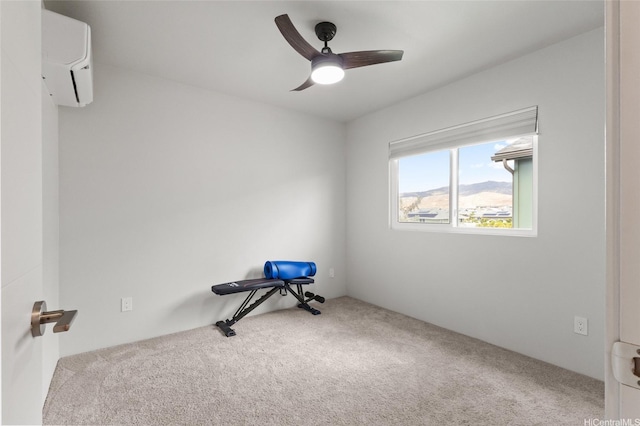 91-1640 Honouliuli St Unit 82, Ewa Beach, HI 96706 - workout room with carpet flooring, a wall mounted air conditioner, and ceiling fan