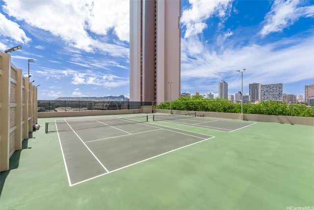 2499 Kapiolani Blvd Unit 2109, Honolulu, HI 96826 - view of tennis court featuring a skyline view and community basketball court