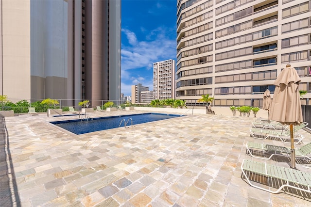 2499 Kapiolani Blvd Unit 2109, Honolulu, HI 96826 - community pool featuring a city view and a patio