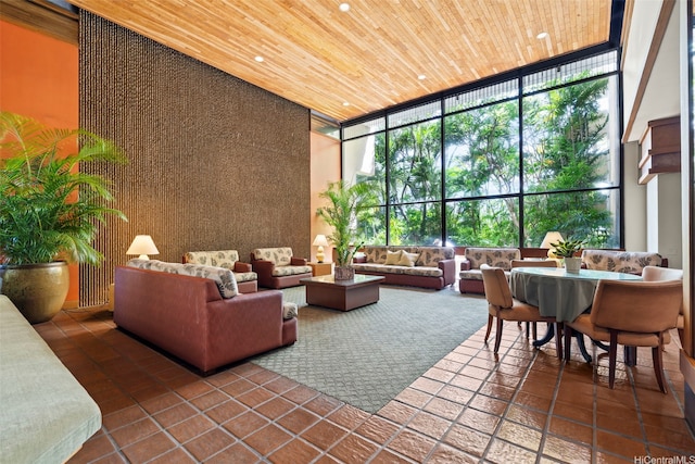 2121 Ala Wai Blvd Unit 1902, Honolulu, HI 96815 - community lobby featuring a high ceiling, a wall of windows, wood ceiling, and recessed lighting