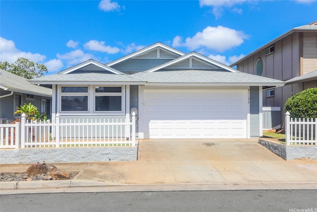 91-196 Wailohia Pl, Ewa Beach, HI 96706 - ranch-style house with a garage, a shingled roof, and concrete driveway