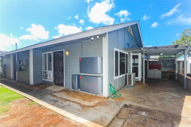 91-196 Wailohia Pl, Ewa Beach, HI 96706 - back of property featuring a patio area and cooling unit
