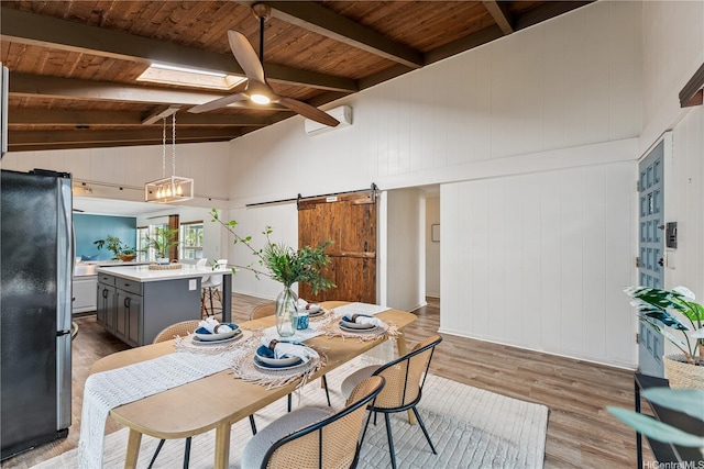 92-434 Kaiaulu St, Kapolei, HI 96707 - dining room featuring a barn door, light wood finished floors, a wooden ceiling with exposed beams, a ceiling fan, and high vaulted ceiling