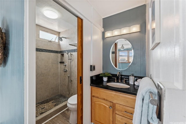 92-434 Kaiaulu St, Kapolei, HI 96707 - full bath featuring a tile shower, vanity, and wood finished floors