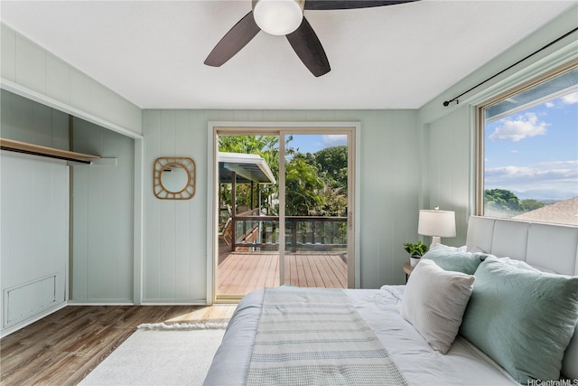 92-434 Kaiaulu St, Kapolei, HI 96707 - bedroom with wood finished floors, access to outside, and ceiling fan