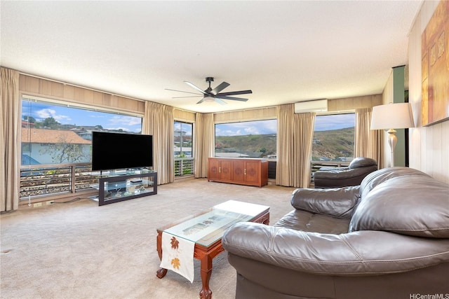 4692 Likini St, Honolulu, HI 96818 - living area featuring a wall mounted AC, ceiling fan, carpet flooring, and wood walls