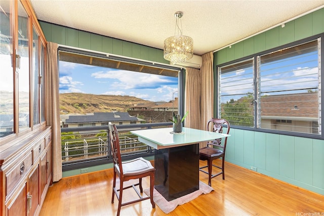 4692 Likini St, Honolulu, HI 96818 - sunroom with a chandelier and a mountain view