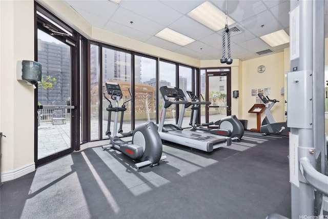 445 Seaside Ave Unit 3316, Honolulu, HI 96815 - workout area featuring a paneled ceiling and baseboards